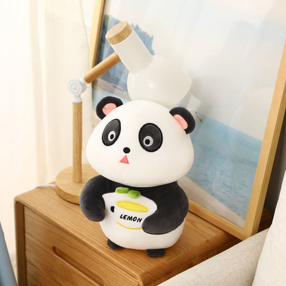Jouet moelleux panda de toutes tailles dans un style tendance citron.